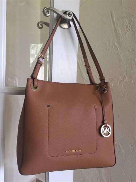 michael kors tote acorn|Amazon.com: Michael Kors Acorn Handbags.